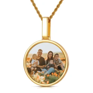 Oval gold pendant necklace with a family photo inside.