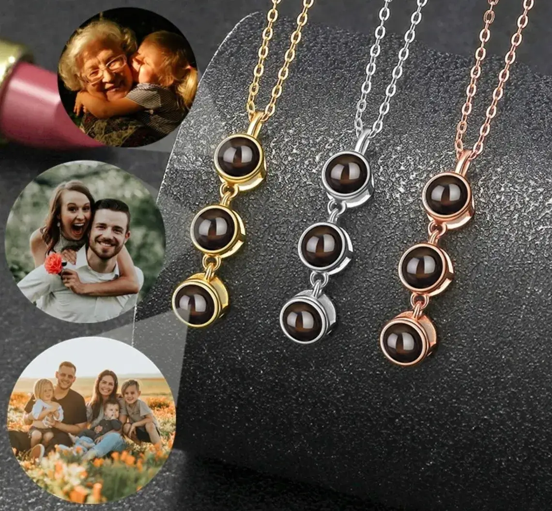 Custom photo pendant necklaces with personalized images and initials.