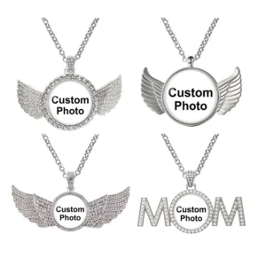 Four silver necklaces with winged designs and photo frames.