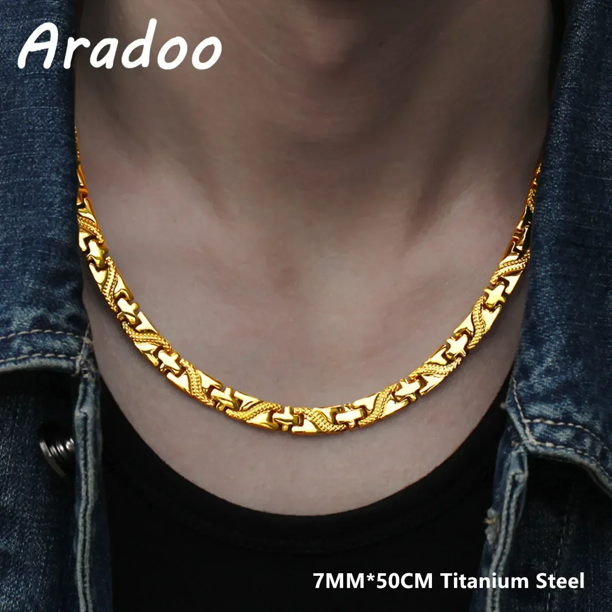 Gold-colored titanium necklace on a neck with denim jacket.
