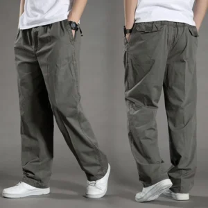 Casual olive-green cargo pants worn with white sneakers.