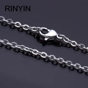 Silver chain with lobster clasp on black.