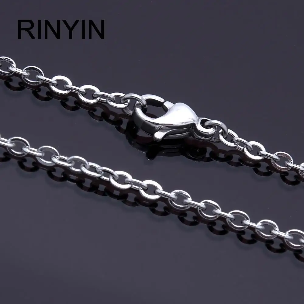 Silver chain with lobster clasp on black.