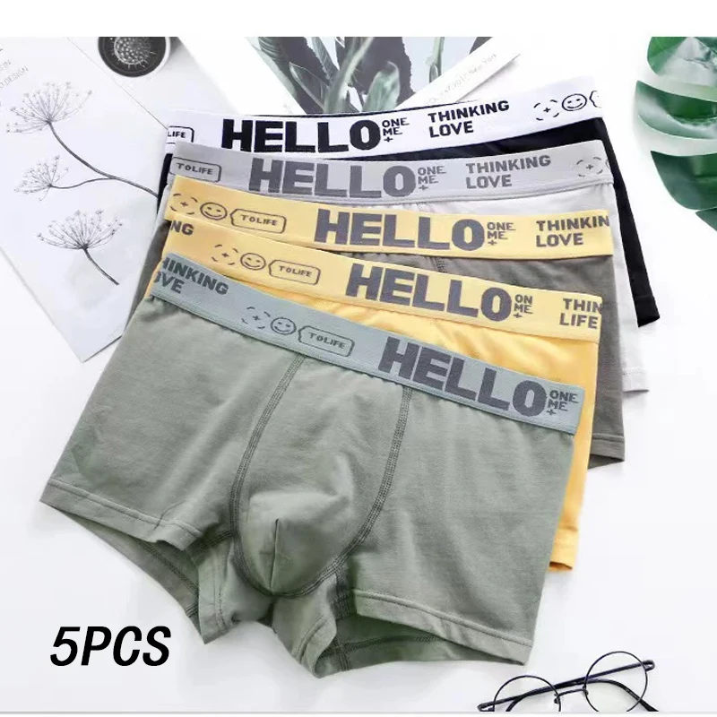 Five pairs of colorful men's underwear.