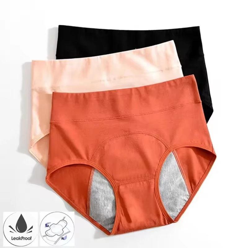 Three pairs of women's high-waisted cotton underwear in black, peach, and rust colors.