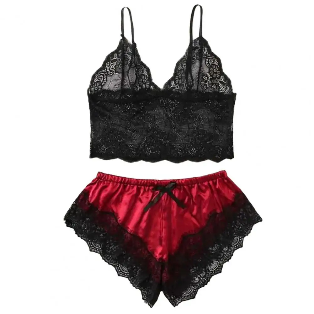 Black lace bralette and red satin lace-trimmed panties set.