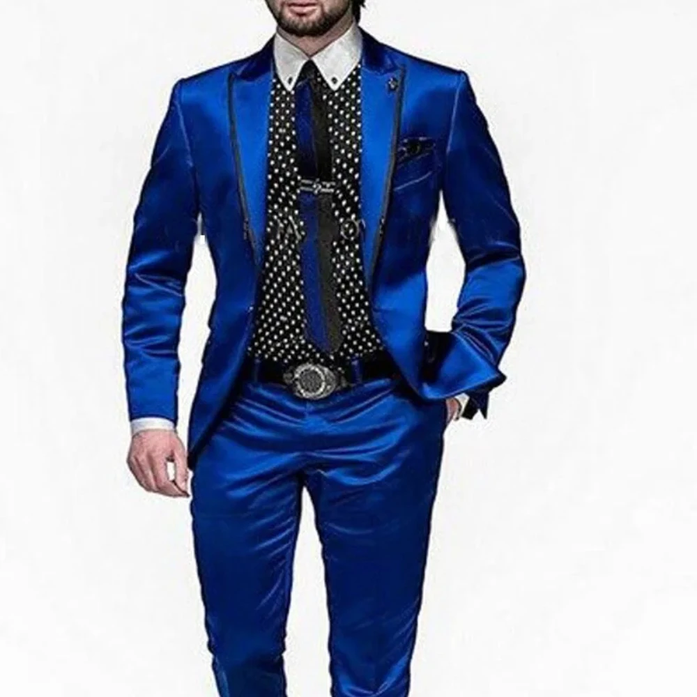 Man in bright blue suit and tie.