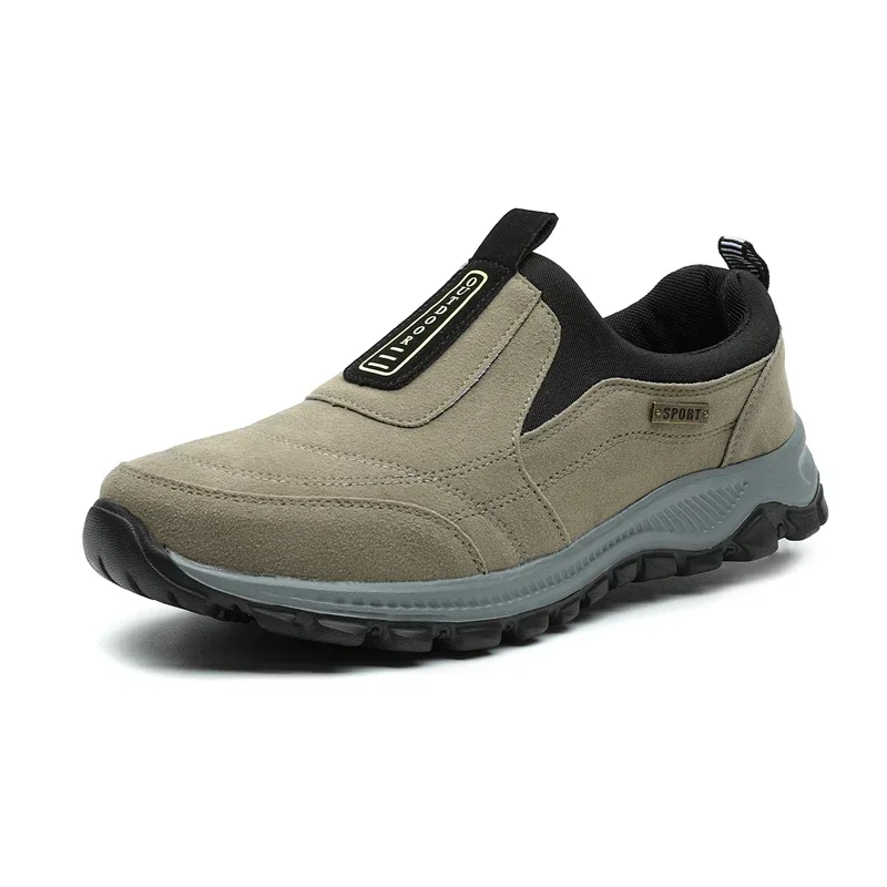 Beige slip-on casual shoe with rugged sole and black accents.