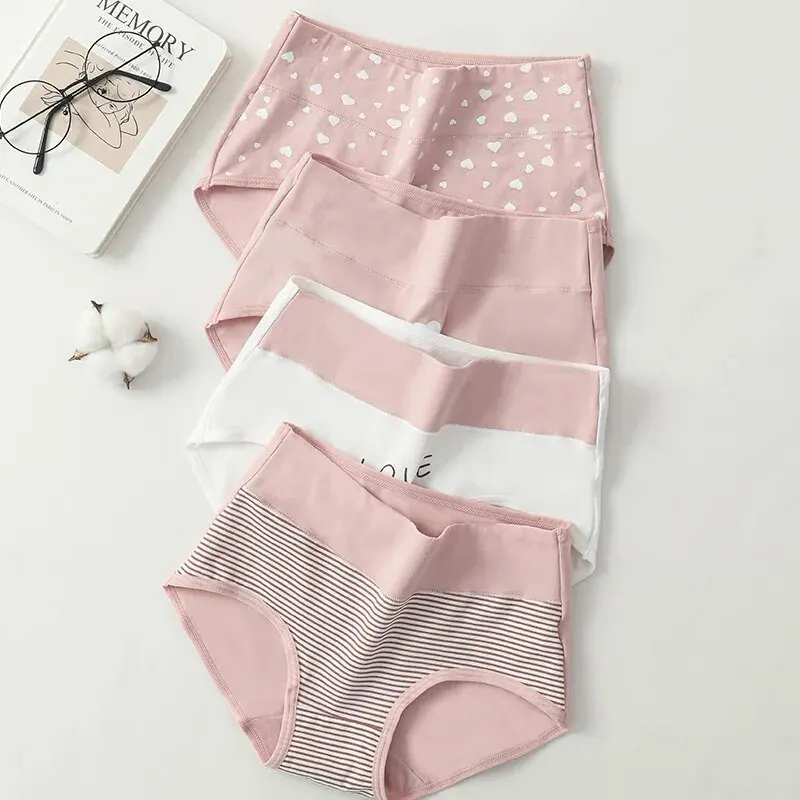 Set of four pastel pink women's underwear with various patterns.