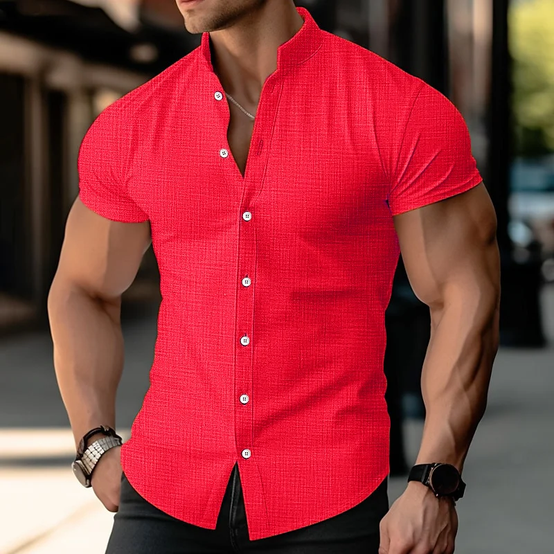 Man wearing a fitted red short-sleeve button-up shirt.