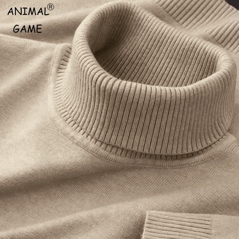 Close-up of a beige ribbed turtleneck sweater.