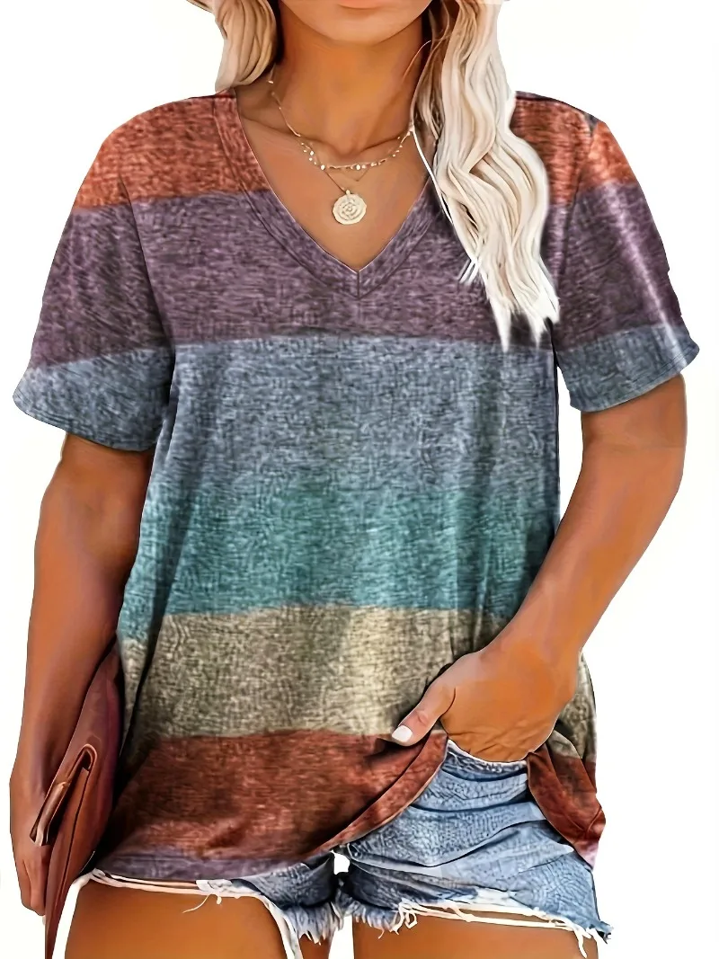Woman wearing a multicolored striped V-neck shirt.