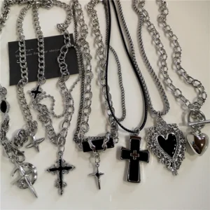 Silver necklaces with various cross pendants.