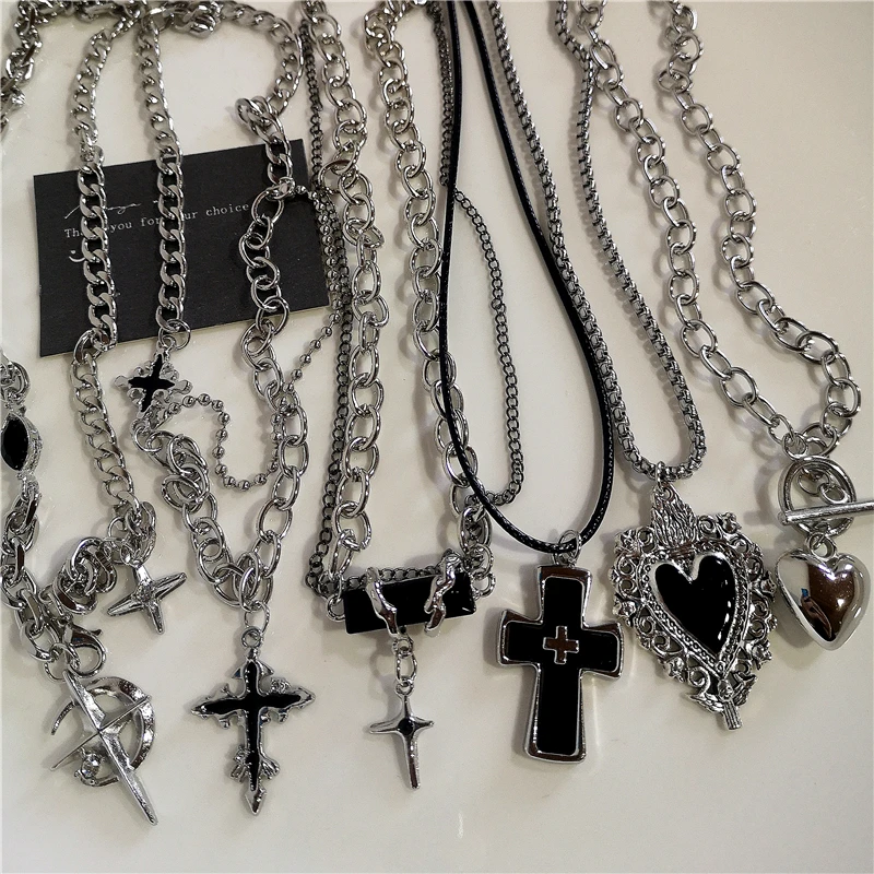 Silver necklaces with various cross pendants.