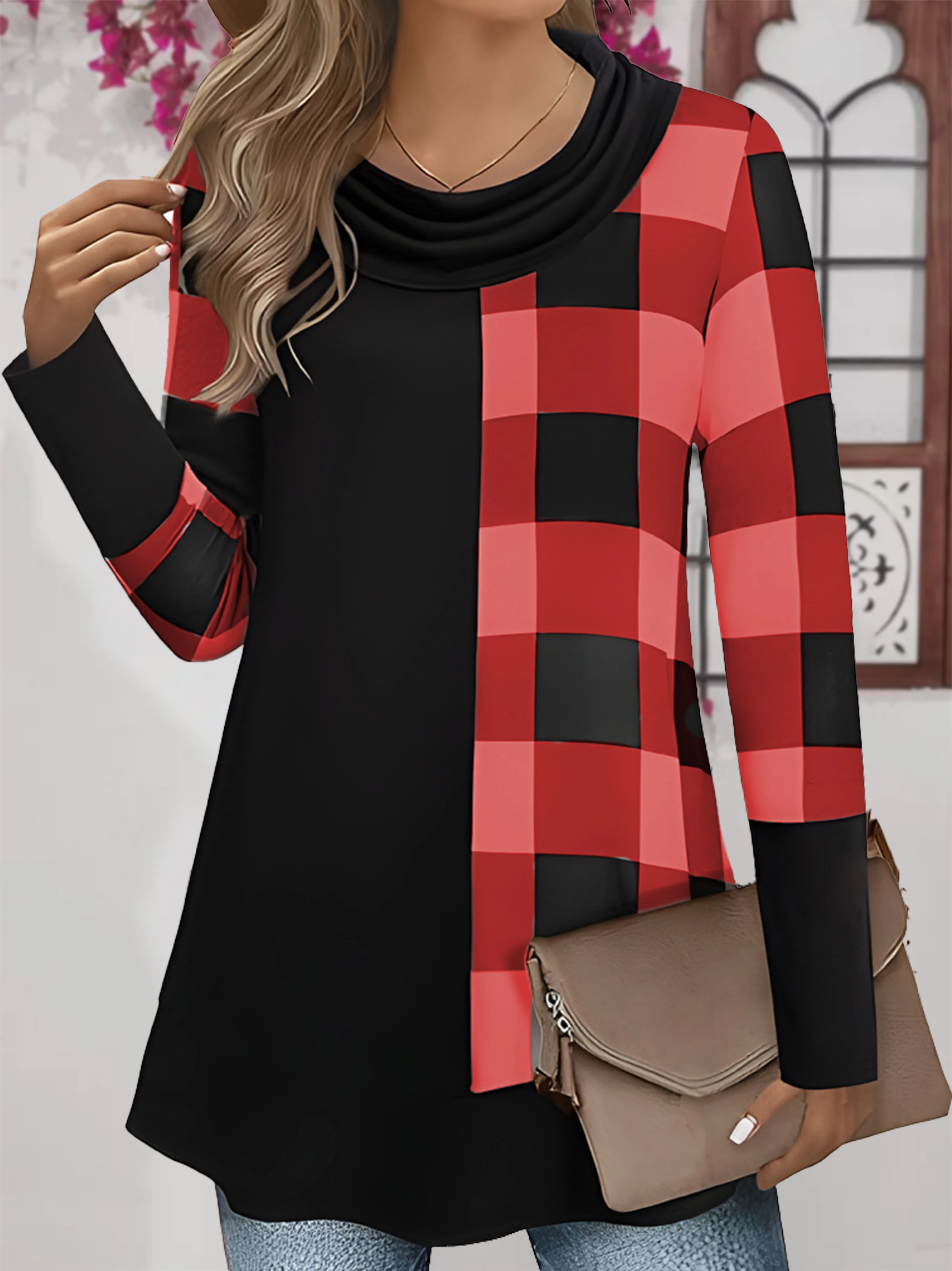 Black and red checkered long-sleeve top with asymmetrical design.