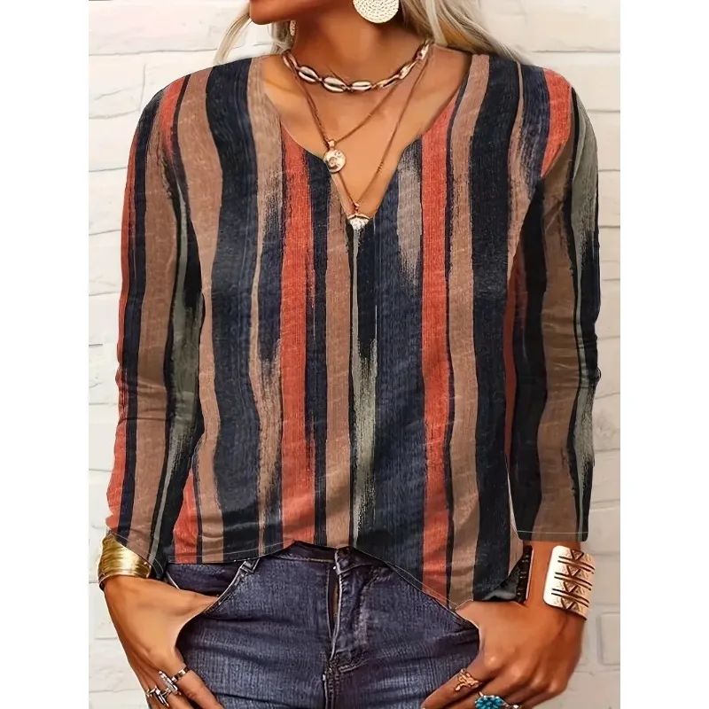 Striped long-sleeve V-neck blouse with earthy tones.