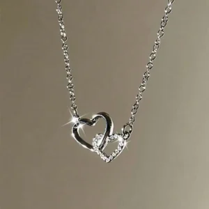Interlocking heart necklace with sparkling diamonds.