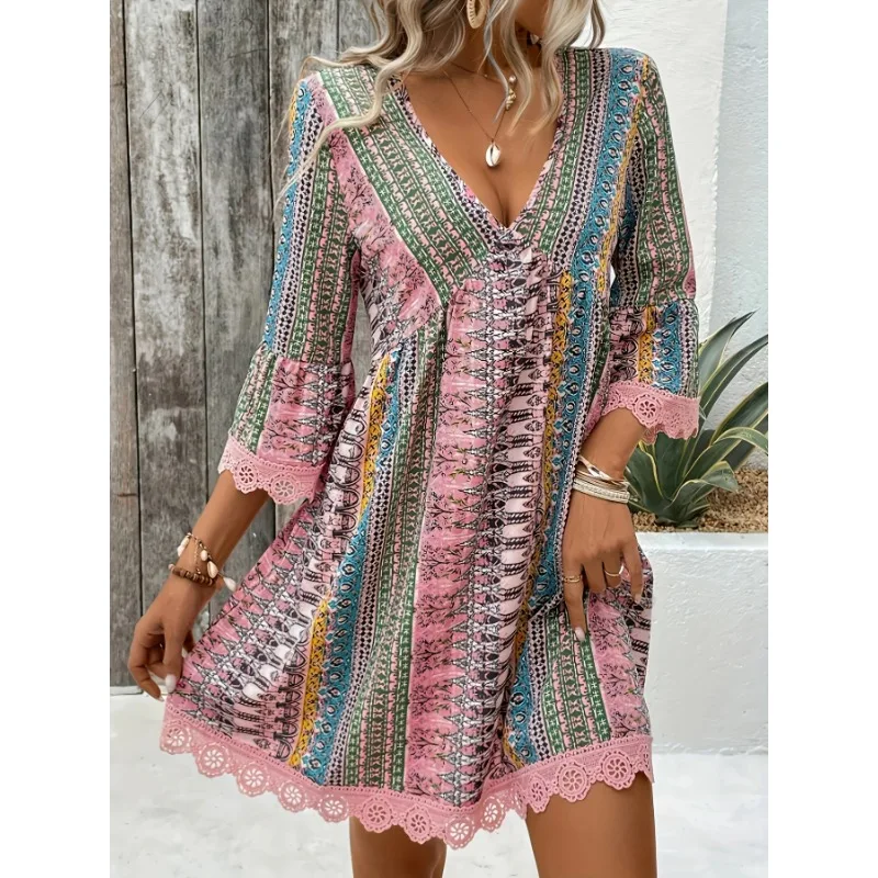 Colorful bohemian dress with lace trim and a V-neckline.