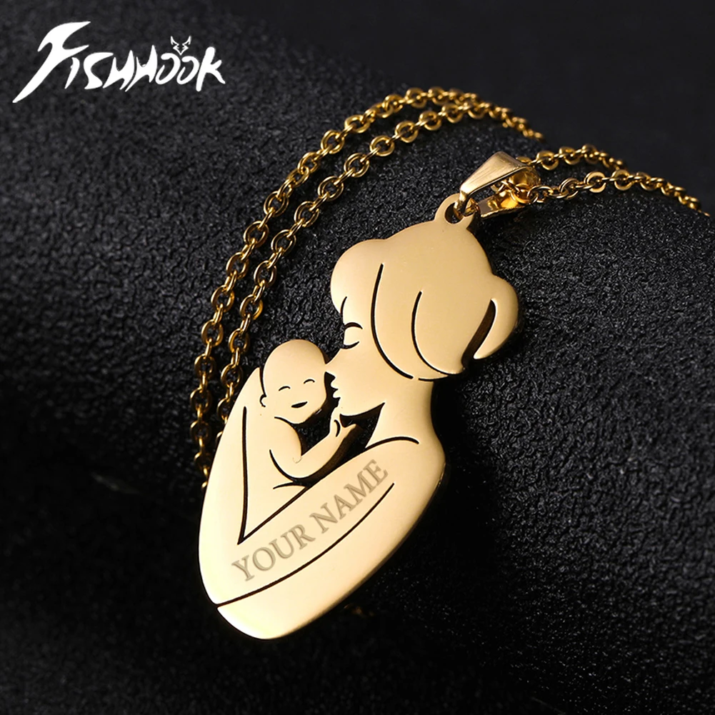 Gold mother and child pendant necklace.