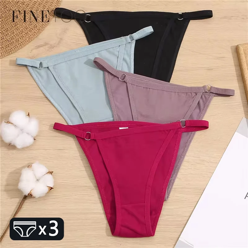 Set of four colorful women's thong underwear laid out flat.