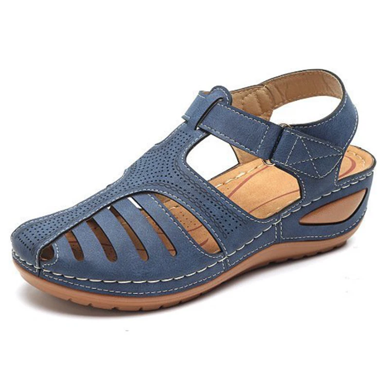 Comfortable blue leather sandal with a closed toe design.