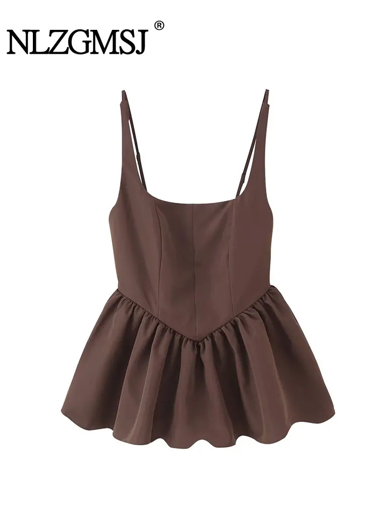 Brown sleeveless dress with a ruffled skirt and thin straps.