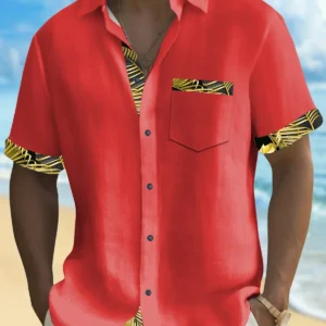 A person wearing a vibrant red short-sleeve shirt with patterned trim.