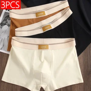 Three pairs of men's cotton underwear displayed.