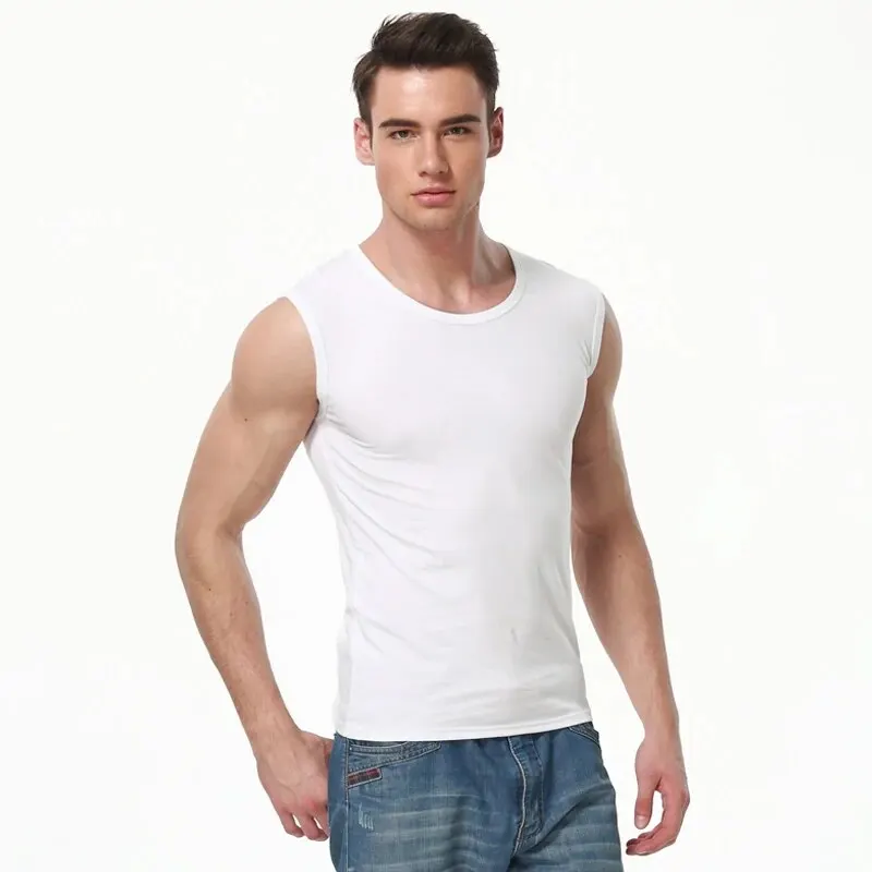 Man in white tank top and jeans.